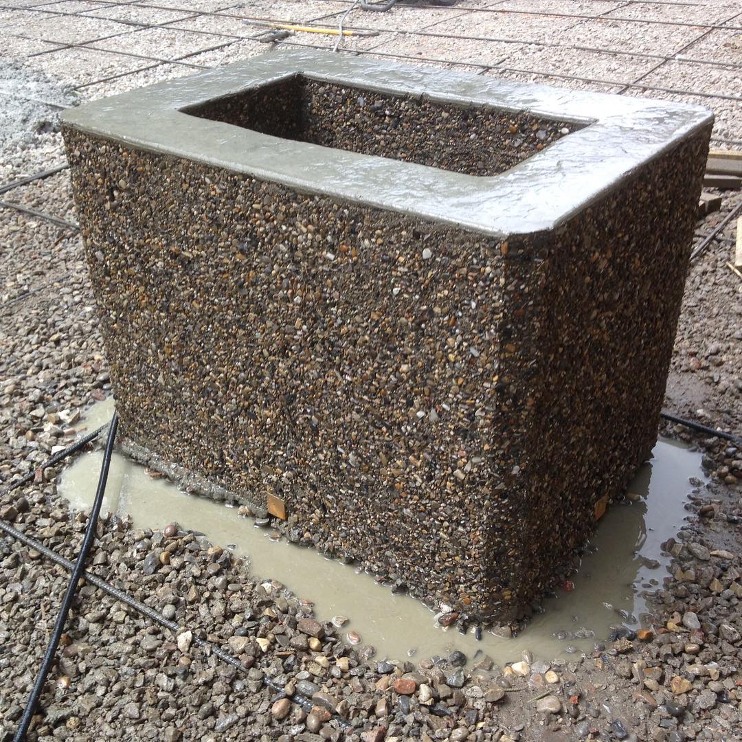 Exposed aggregate concrete planters