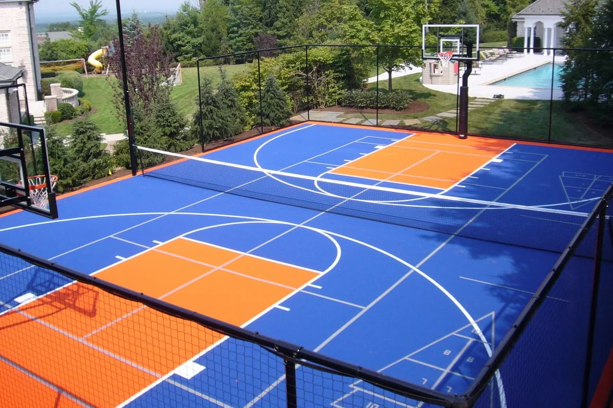 Backyard basketball court with hoop, Calgary